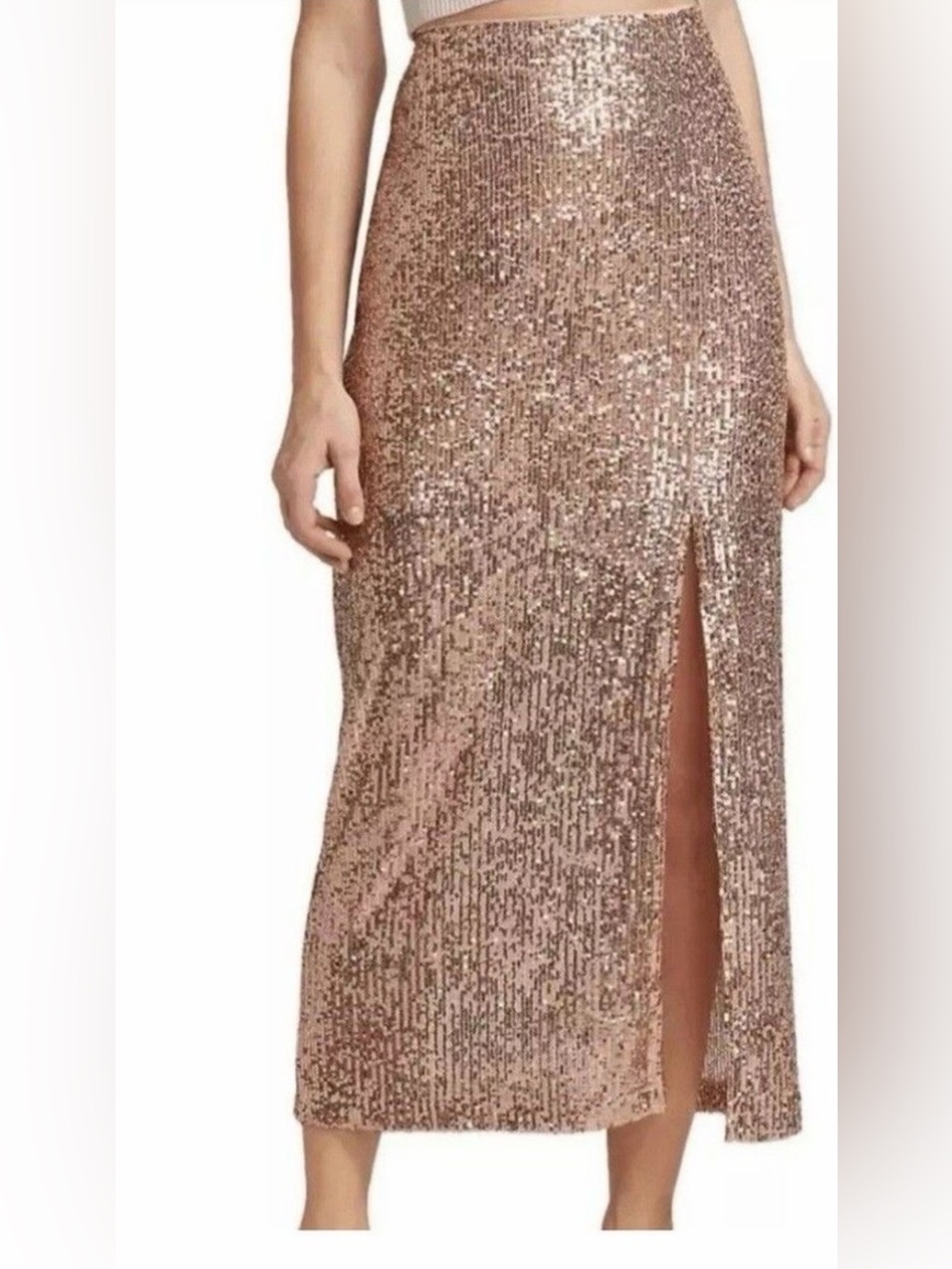 Extremely Rare Free People Ariana Rose Gold Sequin skirt with side slit.